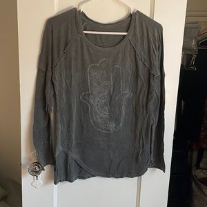 Excellent condition. Grey long sleeve with hands hand graphic.